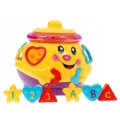 Muzyczny tańczący garnuszek 2056C – interaktywna zabawka edukacyjna dla dzieci 3+, sorter kształtów z efektami świetlnym
